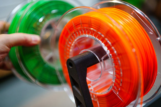 Spools of colorful 3D printing filament for multicolor prints